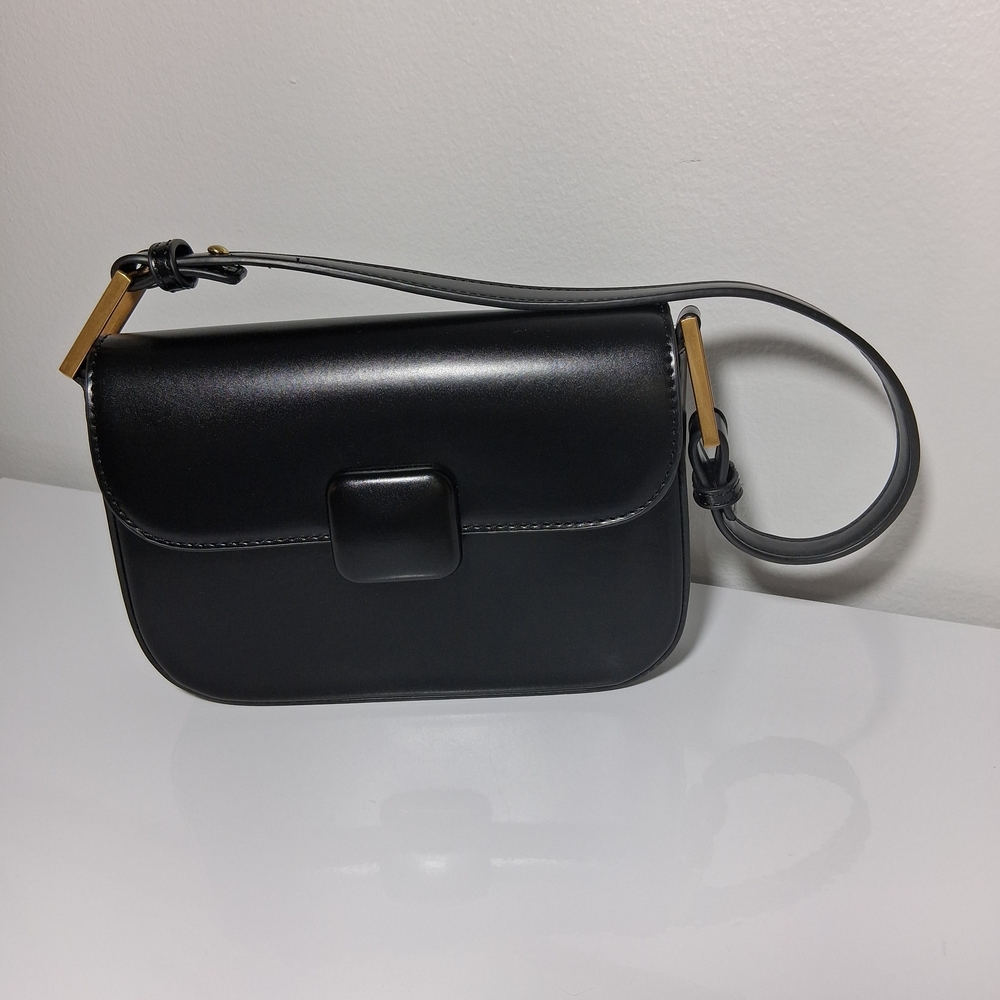 Sleek Black Shoulder Bag with Gold Accents - Picture 2 of 7